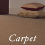 Picture of beige carpet with cushions